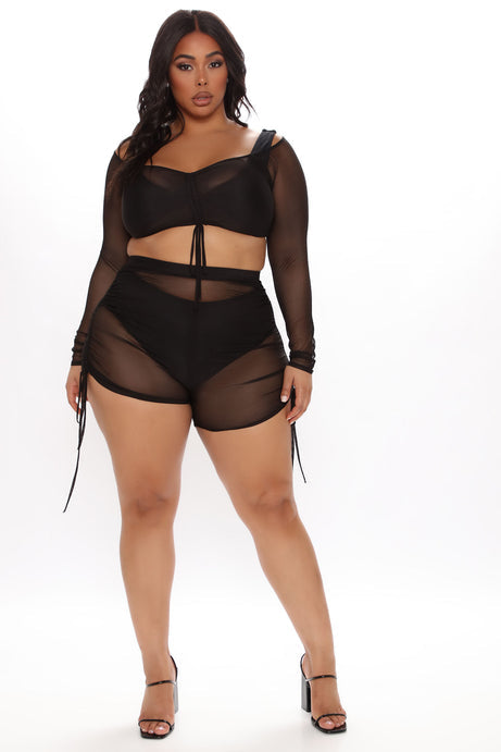 Maillot de bain quatre pièces en résille noire
